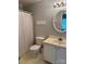 Bathroom with toilet, mirror, and sink at 303 Eastwood Dr, Salisbury, NC 28146