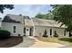 Inviting single story home featuring a well-manicured lawn, sidewalk, and neutral siding at 303 Eastwood Dr, Salisbury, NC 28146