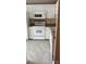 Efficient kitchen offers classic white cabinets and appliances at 303 Eastwood Dr, Salisbury, NC 28146