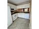 Well-lit kitchen with white cabinets and countertops at 303 Eastwood Dr, Salisbury, NC 28146