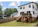 Large backyard with a wooden deck, providing a private outdoor space at 304 Keswick Ave, Charlotte, NC 28206