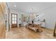 Cozy dining space with rustic wood table, bench seating, and ample natural light, perfect for Gathering meals at 304 Keswick Ave, Charlotte, NC 28206