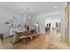 Bright dining area featuring hardwood floors, stylish decor, and seamless flow to other living spaces at 304 Keswick Ave, Charlotte, NC 28206