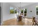 Dining area featuring natural light, stylish pendant lighting, and views to the outdoors at 304 Keswick Ave, Charlotte, NC 28206
