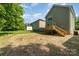 A spacious backyard features a wooden deck and plenty of room for outdoor activities at 312 Adams St, Salisbury, NC 28144
