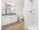 Full bath featuring granite countertop, wood-look floors and a shower-tub combination at 312 Adams St, Salisbury, NC 28144