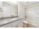 Bathroom featuring a granite countertop, modern vanity, and a shower and tub combo at 312 Adams St, Salisbury, NC 28144