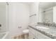 Bathroom featuring granite countertop, modern vanity, and a shower and tub combo at 312 Adams St, Salisbury, NC 28144