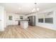 Bright kitchen with white cabinets, stainless appliances and a granite-topped island at 312 Adams St, Salisbury, NC 28144