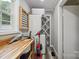 The laundry room features a wooden counter and a washer and dryer at 327 Holly Dr, Mount Holly, NC 28120