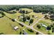 Aerial view displaying a property surrounded by lush greenery and a quiet neighborhood at 338 Hickory Grove Rd, Harmony, NC 28634