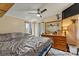 Spacious bedroom with a ceiling fan, large dresser and decorative wall mirror at 338 Hickory Grove Rd, Harmony, NC 28634