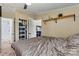 Comfortable bedroom featuring an ensuite bathroom, closet and convenient open shelf at 338 Hickory Grove Rd, Harmony, NC 28634