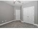 Bedroom featuring neutral walls, plush carpet, and closet at 3709 Creek Ridge Dr, Denver, NC 28037