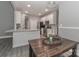 Modern kitchen with stainless steel appliances and a kitchen island at 3709 Creek Ridge Dr, Denver, NC 28037
