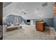 Bonus room with wet bar, seating area, and carpet flooring at 389 Ponderosa Cir, Mooresville, NC 28117