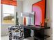 Bright office space with zebra chair, large window view, and colorful contemporary art at 4110 Lattistep Ln, Charlotte, NC 28269