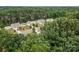 Neighborhood aerial view highlighting mature trees and landscaped yards surrounding the homes at 413 Wheat Field Dr, Mount Holly, NC 28120