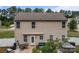 View of the back of the house with a patio including furniture and a grill at 413 Wheat Field Dr, Mount Holly, NC 28120