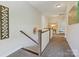 A view of the second story hallway with access to multiple rooms at 4151 Green Park Ct, Harrisburg, NC 28075