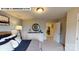Comfortable bedroom featuring a bed, dresser, lamp and ceiling light at 505 York Rd, Troutman, NC 28166