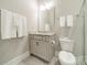 Cozy bathroom featuring a single vanity and white fixtures at 515 Lizzie Ln, Fort Mill, SC 29708