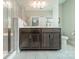 Bathroom featuring double sinks and a shower with a glass door at 515 Lizzie Ln, Fort Mill, SC 29708