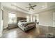 Large bedroom features hardwood floors, recessed lighting, and neutral paint at 515 Lizzie Ln, Fort Mill, SC 29708