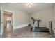 Workout room featuring a treadmill and an open door at 515 Lizzie Ln, Fort Mill, SC 29708