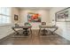 Bright home office with hardwood floors, wainscoting, modern desks, and ample natural light at 515 Lizzie Ln, Fort Mill, SC 29708