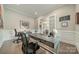 Stylish home office with hardwood floors, glass doors, modern desk, and well-lit workspace at 515 Lizzie Ln, Fort Mill, SC 29708