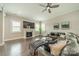 Cozy living room with fireplace, hardwood floors, comfortable seating, and ample natural light at 515 Lizzie Ln, Fort Mill, SC 29708