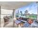 Spacious outdoor balcony featuring a comfortable seating area with a great view of the city skyline at 520 E Martin Luther King Jr Blvd # 1002, Charlotte, NC 28202