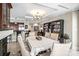 Bright dining area with a view of the kitchen and open living space at 520 E Martin Luther King Jr Blvd # 1002, Charlotte, NC 28202