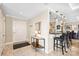 Entryway with adjacent bar area featuring marble floors and neutral walls at 520 E Martin Luther King Jr Blvd # 1002, Charlotte, NC 28202