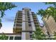 An impressive high-rise building with modern architecture featuring many balconies at 520 E Martin Luther King Jr Blvd # 1002, Charlotte, NC 28202