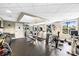 A spacious gym featuring a variety of exercise equipment with large windows at 520 E Martin Luther King Jr Blvd # 1002, Charlotte, NC 28202