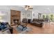 Inviting living room featuring a cozy fireplace and hardwood floors at 648 Odell School Rd, Concord, NC 28027