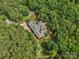 Aerial view showcasing the backyard pool, lush landscaping and private setting at 6742 Charlotte Hwy, York, SC 29745
