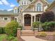 Close up of front entrance with stone accents, arched doors, and brick entryway at 6742 Charlotte Hwy, York, SC 29745