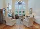 Bright living room with fireplace, large windows, and classic decor at 6742 Charlotte Hwy, York, SC 29745