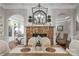 Dining room featuring a fireplace, and entryways into other rooms at 8301 Caesars Head Dr, Waxhaw, NC 28173