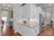 The butler's pantry has granite countertops, white cabinets, and stainless steel appliances at 8301 Caesars Head Dr, Waxhaw, NC 28173