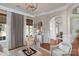 Relaxing living area features natural light from large windows, archways and hardwood floors at 8301 Caesars Head Dr, Waxhaw, NC 28173