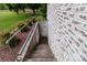 Exterior access to basement with stairs and railing at 9135 Stokes Ferry Rd, Salisbury, NC 28146