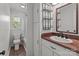 Updated bathroom featuring tile floor, tub with shower, sink, and vanity at 9135 Stokes Ferry Rd, Salisbury, NC 28146
