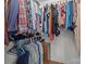 Walk-in closet provides ample storage space for clothing at 9135 Stokes Ferry Rd, Salisbury, NC 28146