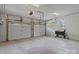 Spacious two-car garage with ample room for vehicles and storage, enhanced by bright lighting at 9135 Stokes Ferry Rd, Salisbury, NC 28146