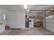 Functional garage with storage shelves, offering practical space for tools and equipment at 9135 Stokes Ferry Rd, Salisbury, NC 28146