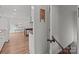 Interior view of the home with hardwood floors, staircase, and access to the kitchen at 9135 Stokes Ferry Rd, Salisbury, NC 28146